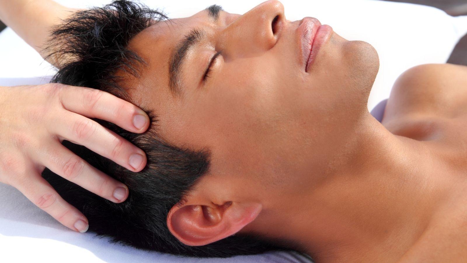 Image of man receiving indian head massage