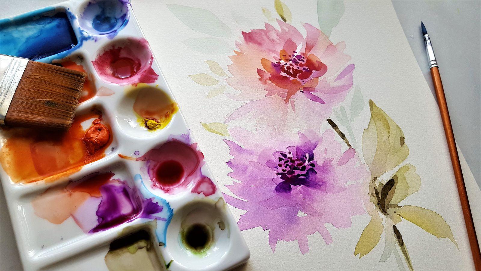 image of art supplies and watercolour painted flowers<br />
