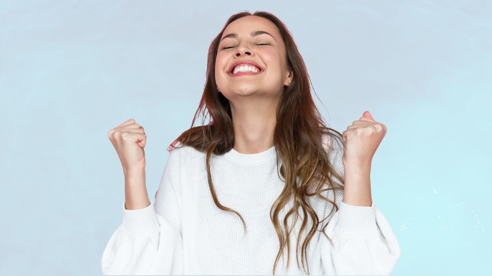 improve your self esteem by celebrating everything image of woman looking happy on blue background