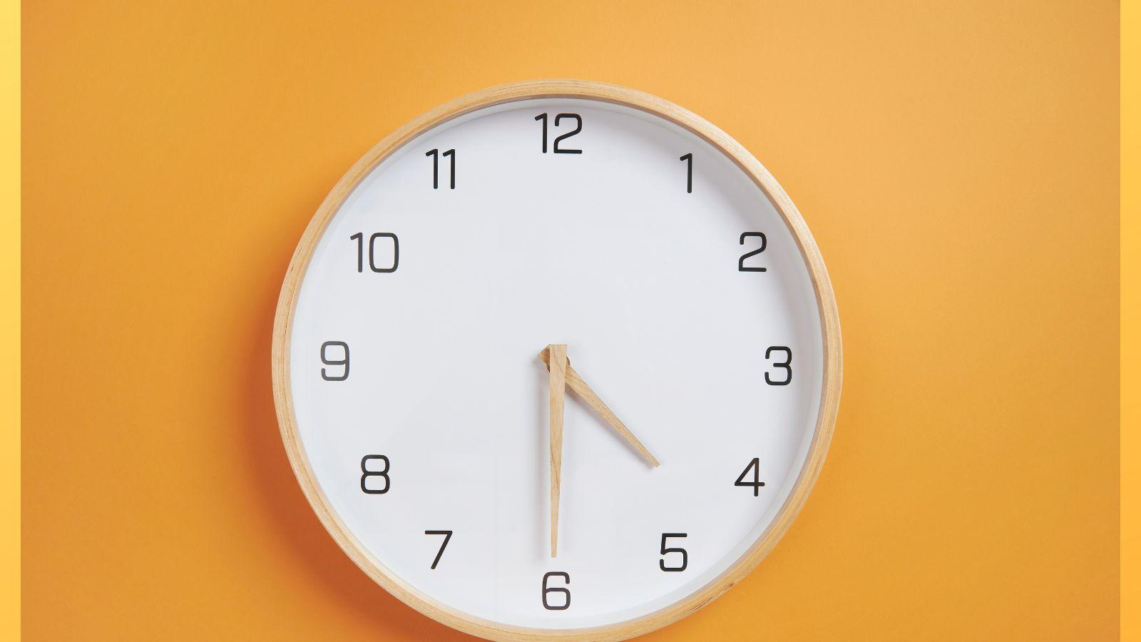 creative image of a clock on an orange background